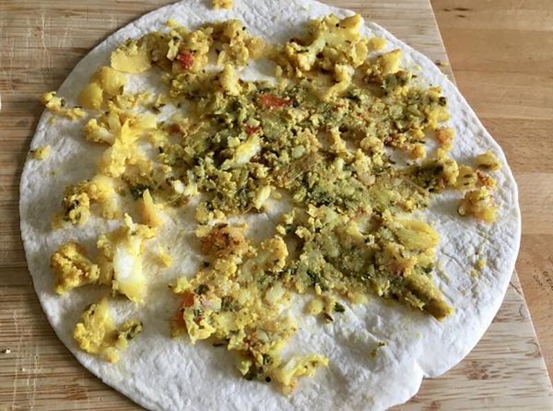 Paratha (Indian Flatbread) made from Leftover Chapatis and Dry Vegetable Curry - picture