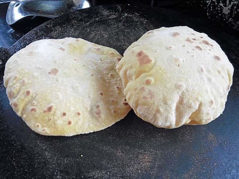 Chapati, Roti or Phulka (Indian Flatbread)  Cooked on a Tava or Pan - picture