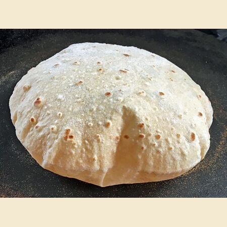 Chapati, Roti or Phulka (Indian Flatbread)  Cooked on a Tava or Pan