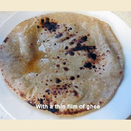 Chapati, Roti or Phulka (Indian Flatbread)  Cooked on a Tava or Pan