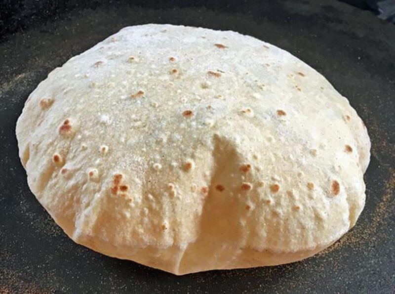 Chapati, Roti or Phulka (Indian Flatbread)  Cooked on a Tava or Pan - picture