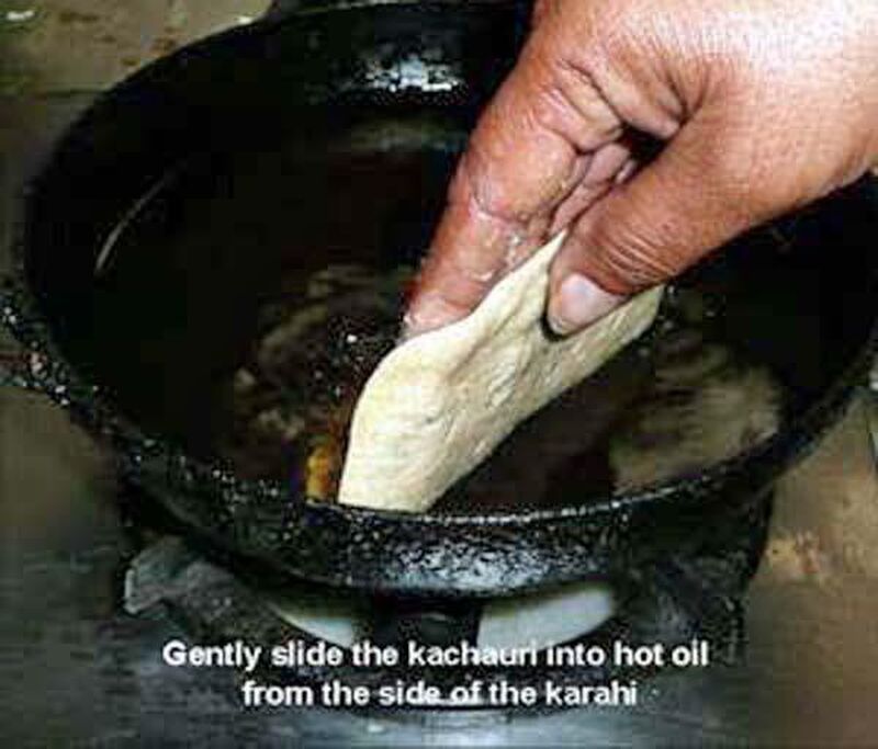 Deep Fried Indian Snack with Urad Dal (Split, Skinless Black Gram) Stuffing (Street Food) - picture