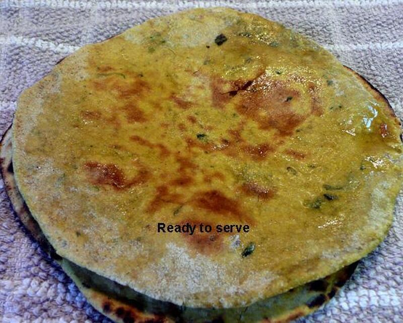 Yellow Chapati, Roti or Phulka (Indian Flatbread) with Turmeric and Fenugreek Leaves - picture