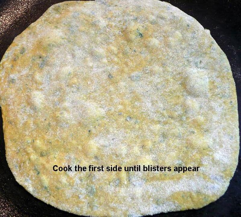 Yellow Chapati, Roti or Phulka (Indian Flatbread) with Turmeric and Fenugreek Leaves - picture
