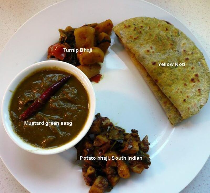 Yellow Chapati, Roti or Phulka (Indian Flatbread) with Turmeric and Fenugreek Leaves - picture