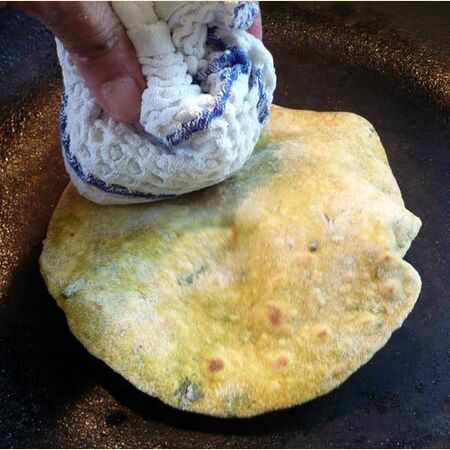 Yellow Chapati, Roti or Phulka (Indian Flatbread) with Turmeric and Fenugreek Leaves